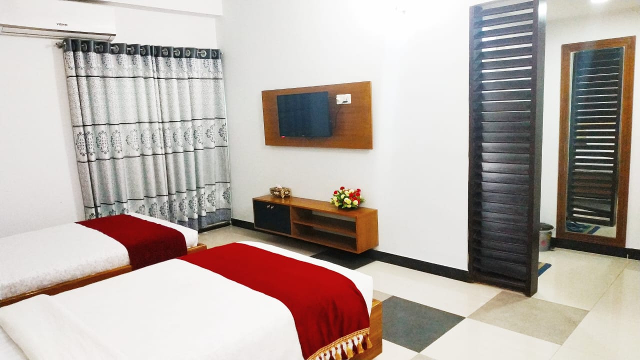 Deluxe Family (1 Couple + 1 Single Bed) – Hotel Khan Palace Kuakata Gallery